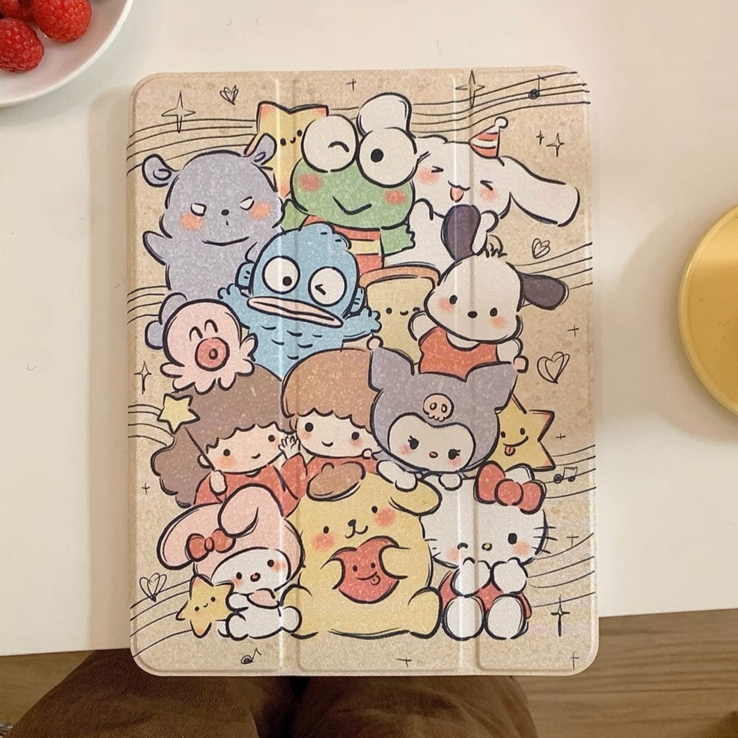 Featuring a heartwarming ensemble of Sanrio characters in a gentle, hand-drawn style. They frolic on musical staves, evoking a sense of harmony and joy with each note and touch.