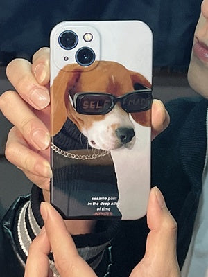 iPhone case. Original design iPhone cases with dog illustrations. Half-covered, super slim & lightweight phone case. Hard polycarbonate material. Man holding front view.