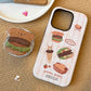 Trendy and cute MagSafe wallet case adorned with puppy and food illustrations for stylish phones featuring cute burger puppy cute Magsafe popsocket