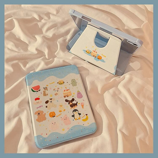 iPad clad in the 'Jellycat Dreamland iPad Case | Cloudy Cuddles Edition' lies on a silky cream fabric, its case dotted with charming Jellycat figures and fluffy clouds, evoking a sense of playful serenity