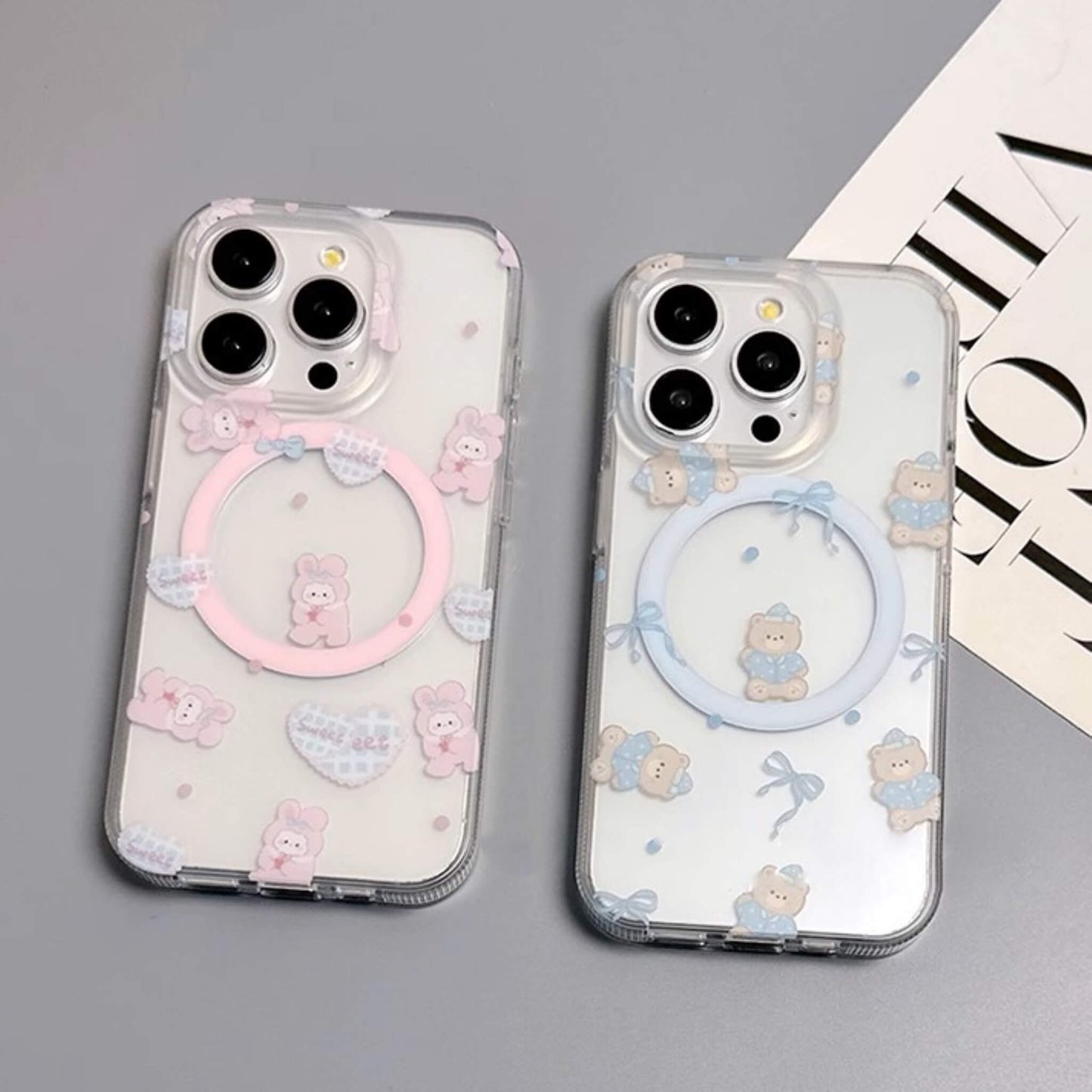 Pink and blue bear-themed MagSafe phone cases, perfect for adding a touch of whimsy to your device. Top view